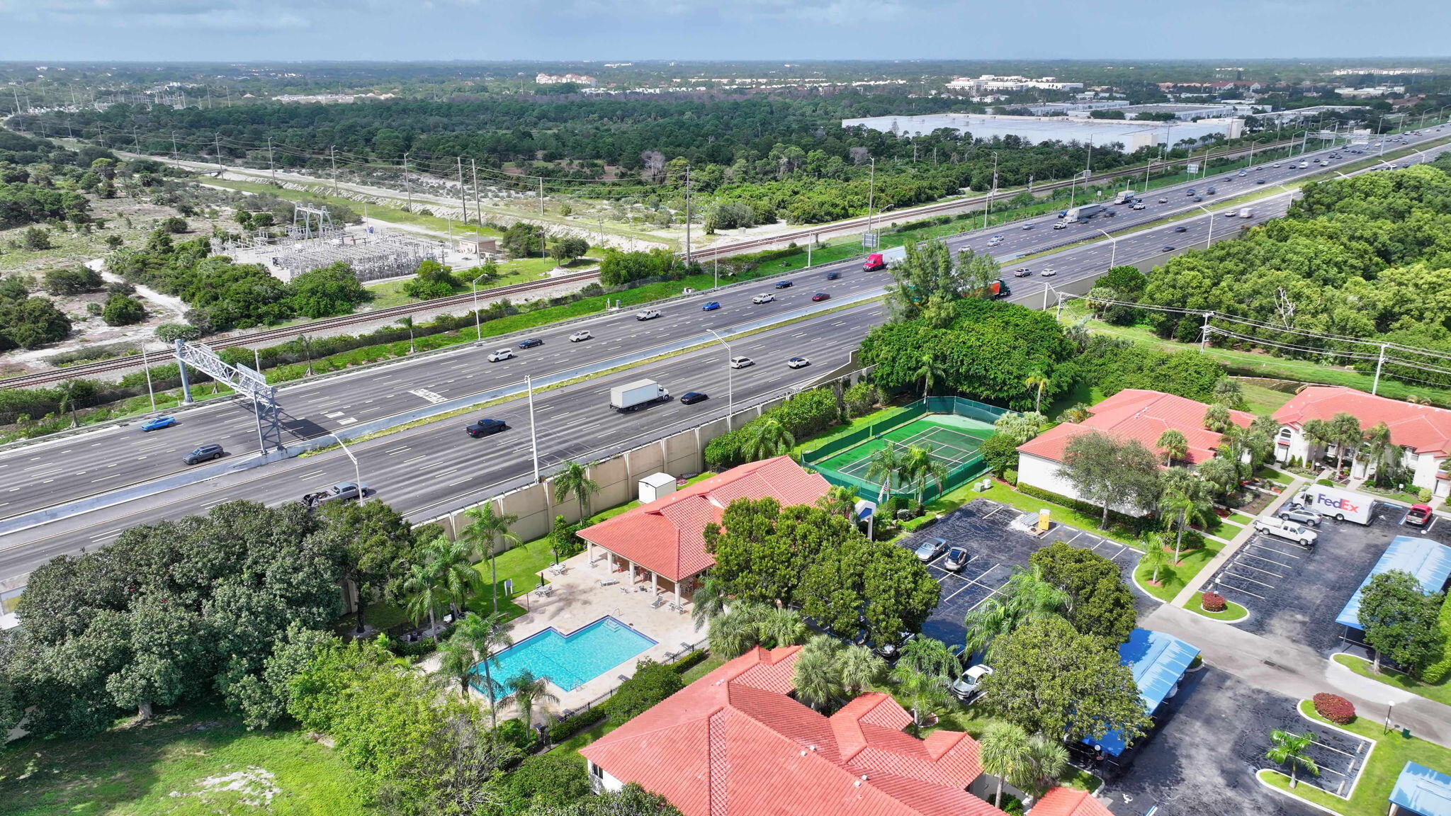 320 Northwest 67th Street, Unit C207 Boca Raton, FL 33487 - Photo 37 of 39 an aerial view of a house with a yard