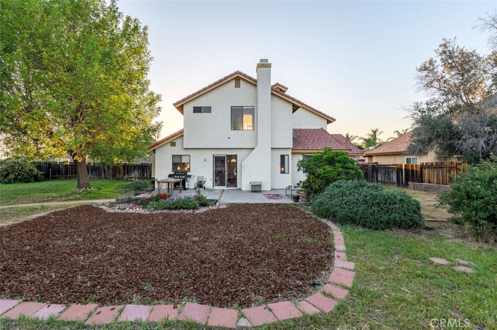 993 South Date Avenue Rialto, CA 92376 - Photo 11 of 27 a view of a house with a yard