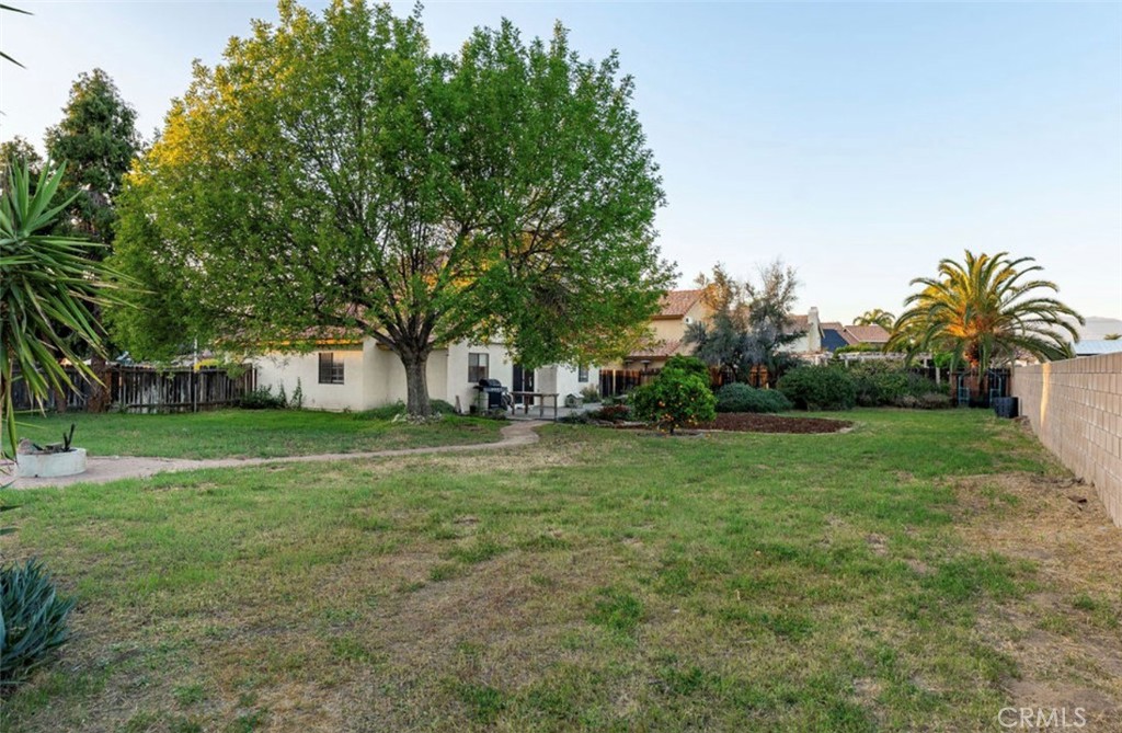 993 South Date Avenue Rialto, CA 92376 - Photo 13 of 27 a view of a house with a yard