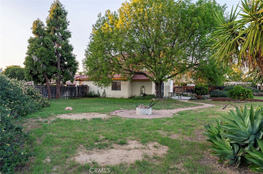 993 South Date Avenue Rialto, CA 92376 - Photo 15 of 27 a front view of house with yard and green space