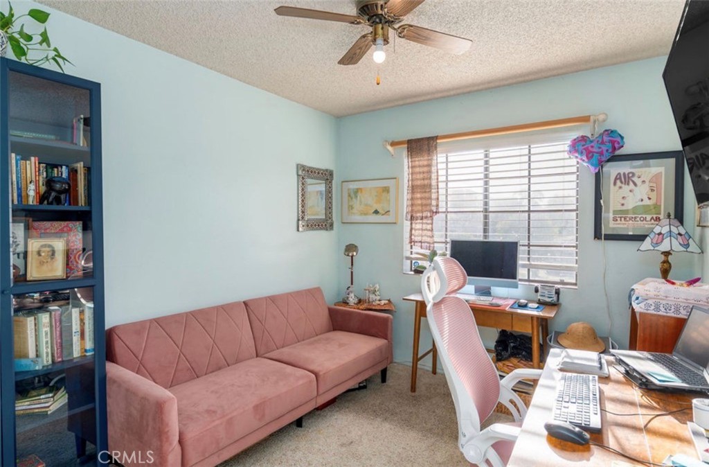 993 South Date Avenue Rialto, CA 92376 - Photo 27 of 27 a view of a livingroom with workspace and a couch