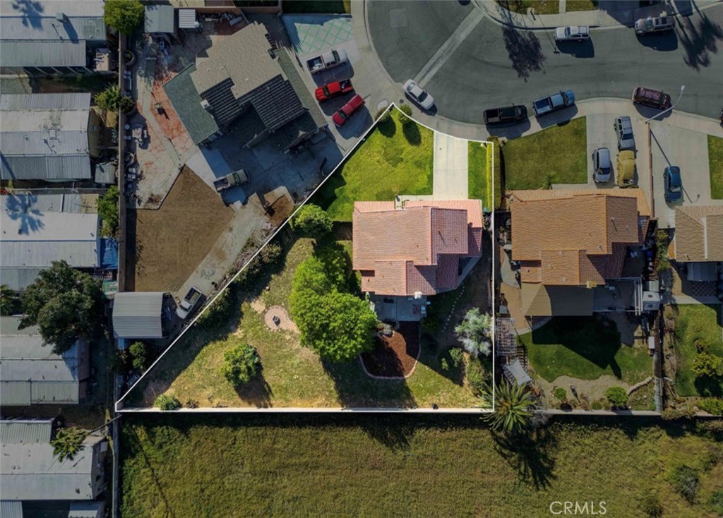 993 South Date Avenue Rialto, CA 92376 - Photo 7 of 27 an aerial view of a house with a lake view