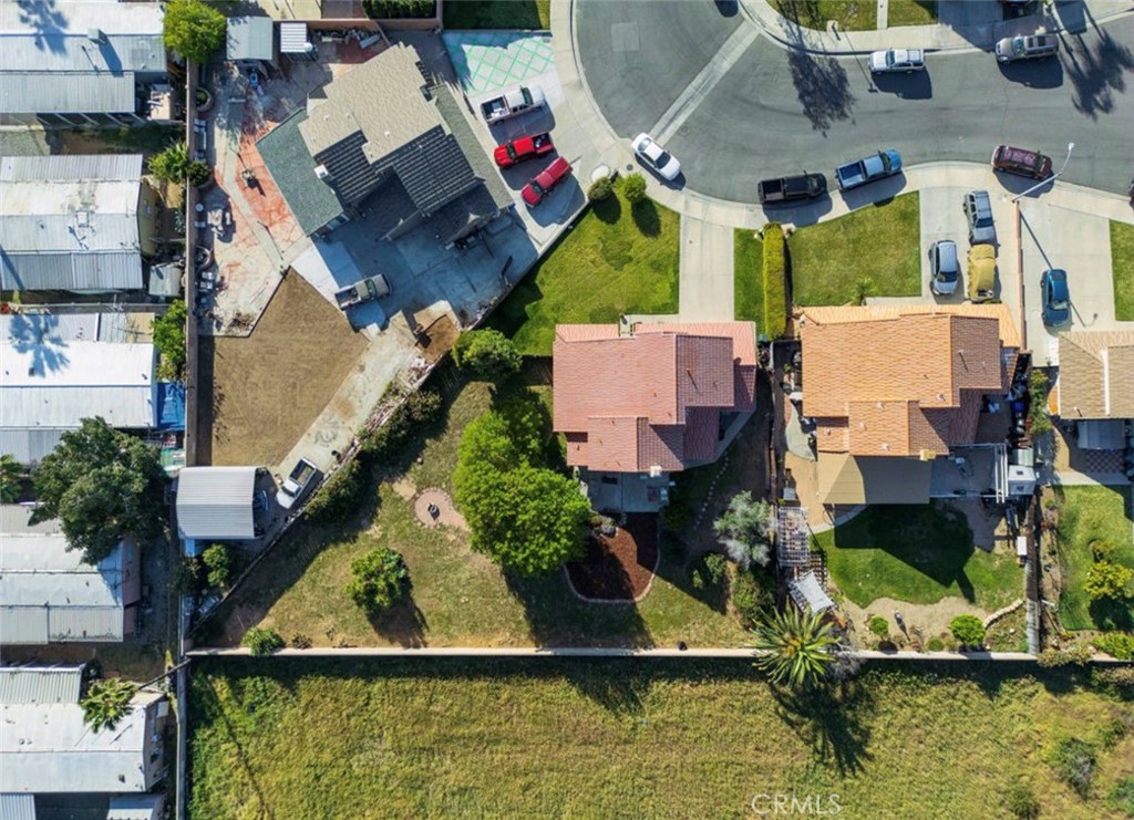 993 South Date Avenue Rialto, CA 92376 - Photo 8 of 27 an aerial view of a house with swimming pool