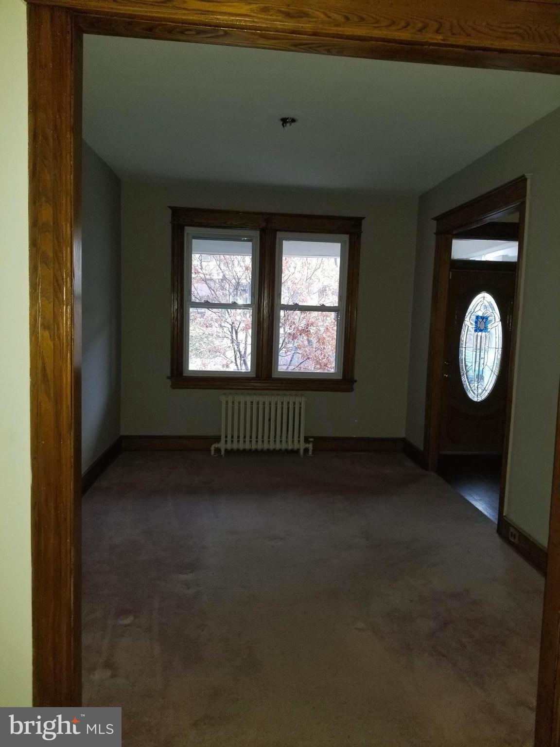 1237 Oates Street Northeast Washington, DC 20002 - Photo 5 of 15 a view of an empty room with a window