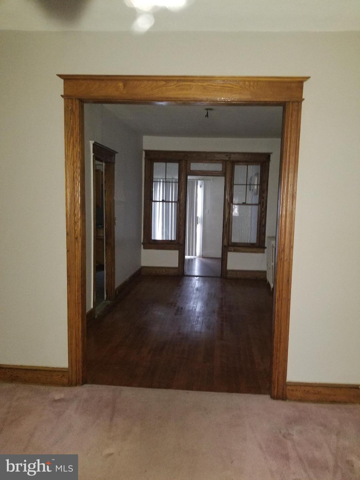 1237 Oates Street Northeast Washington, DC 20002 - Photo 6 of 15 a view of livingroom and window