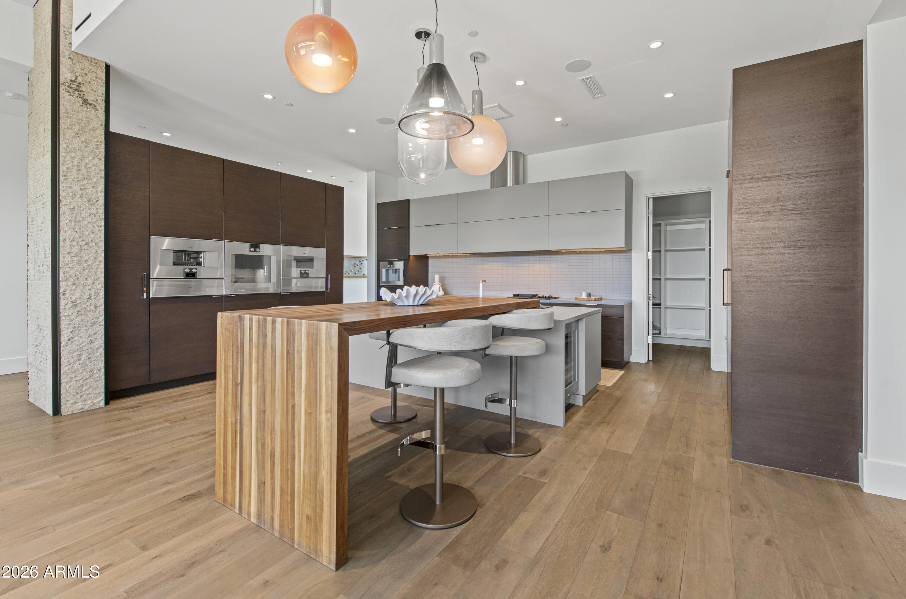 6982 East Joshua Tree Lane Paradise Valley, AZ 85253 - Photo 10 of 34 Waterfall Bar Seating