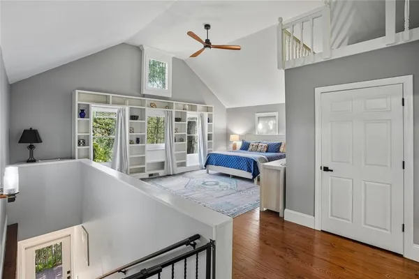 a living room with furniture and large window