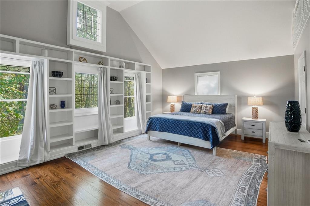 203 Wild Azalea Circle Jasper, GA 30143 - Photo 21 of 37 a bedroom with a large bed and a window