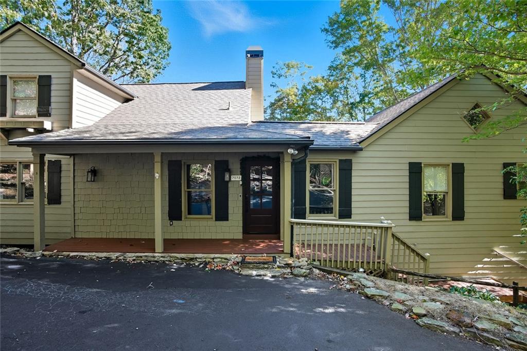 203 Wild Azalea Circle Jasper, GA 30143 - Photo 3 of 37 a view of a house with a garden