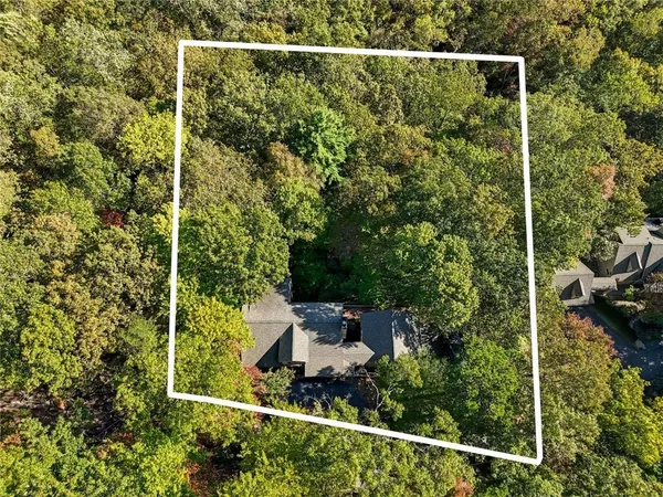 a view of a back yard from a balcony