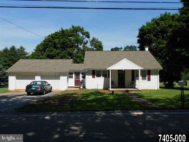2100 Conewago Road Dover, PA 17315 - Photo 1 of 20 a front view of a house with garden
