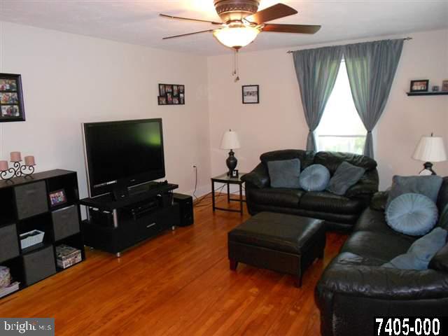 2100 Conewago Road Dover, PA 17315 - Photo 8 of 20 a living room with furniture and a flat screen tv