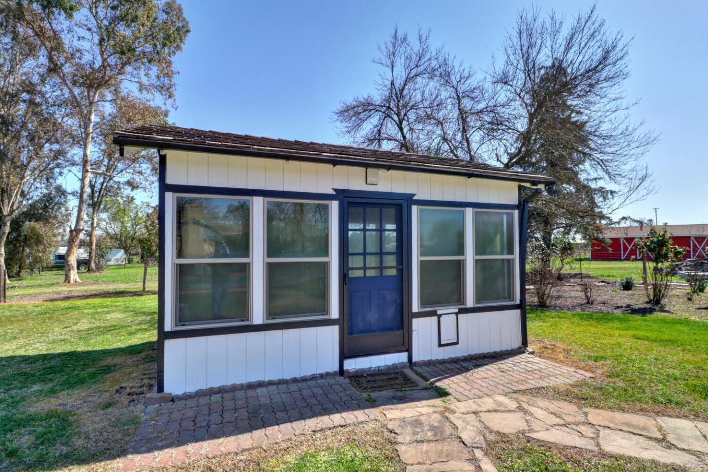9809 Alta Mesa Road Wilton, CA 95693 - Photo 55 of 86 a front view of a house with garden