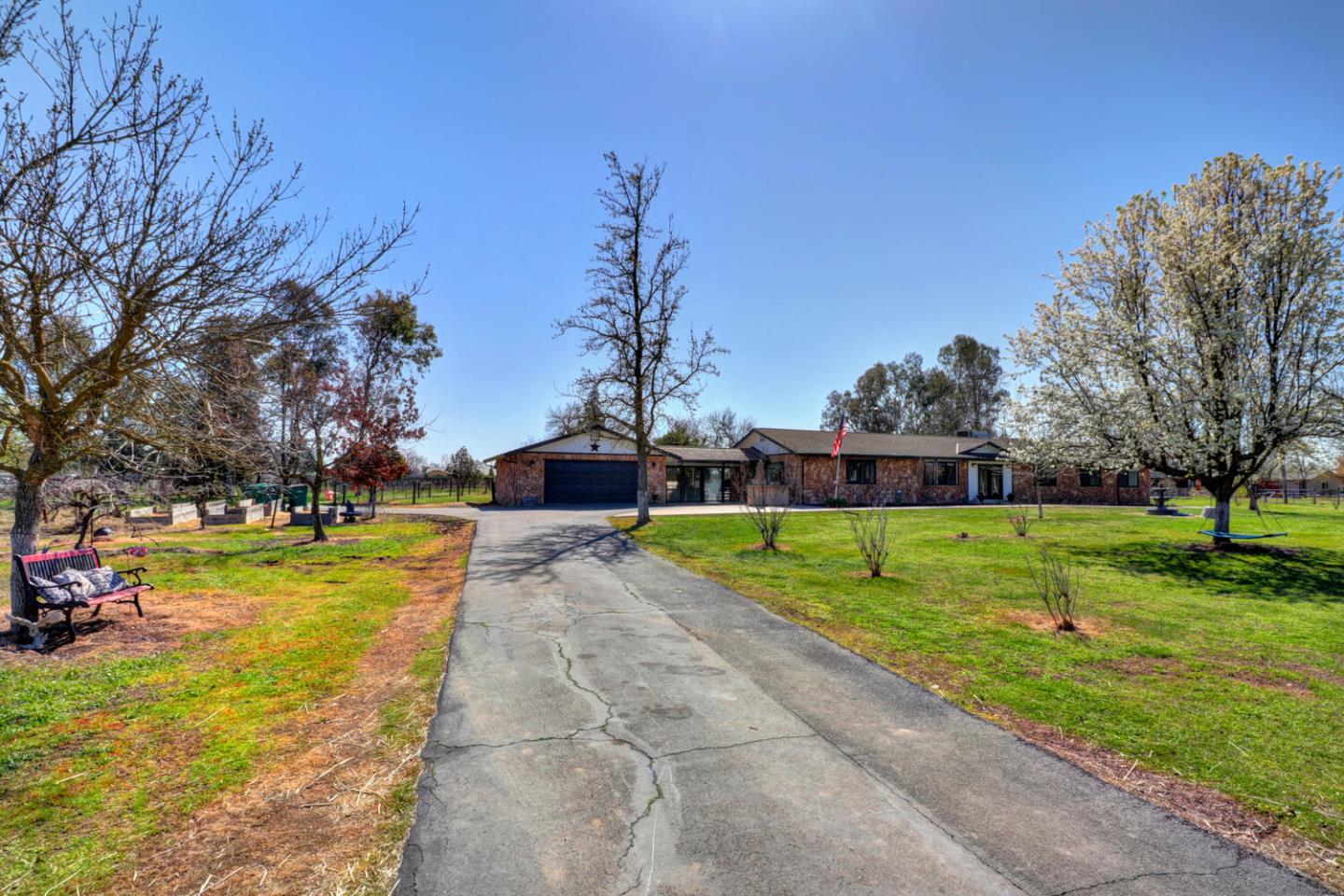 9809 Alta Mesa Road Wilton, CA 95693 - Photo 62 of 86 a view of a swimming pool and a yard