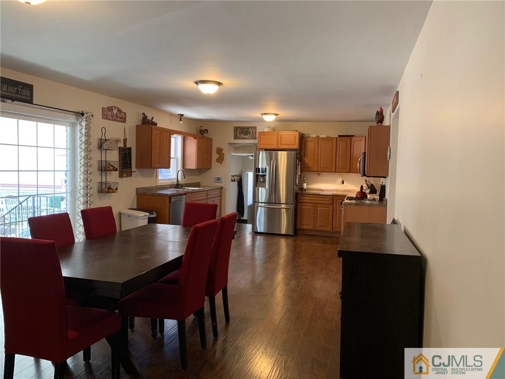 44 Pleasant Valley Road Old Bridge, NJ 08857 - Photo 11 of 14 a view of a dining room with furniture and window