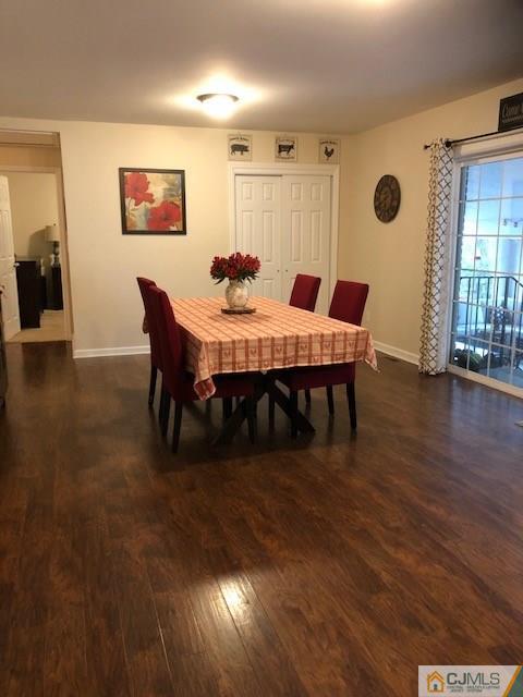 44 Pleasant Valley Road Old Bridge, NJ 08857 - Photo 6 of 14 a view of a dining room with furniture and wooden floor