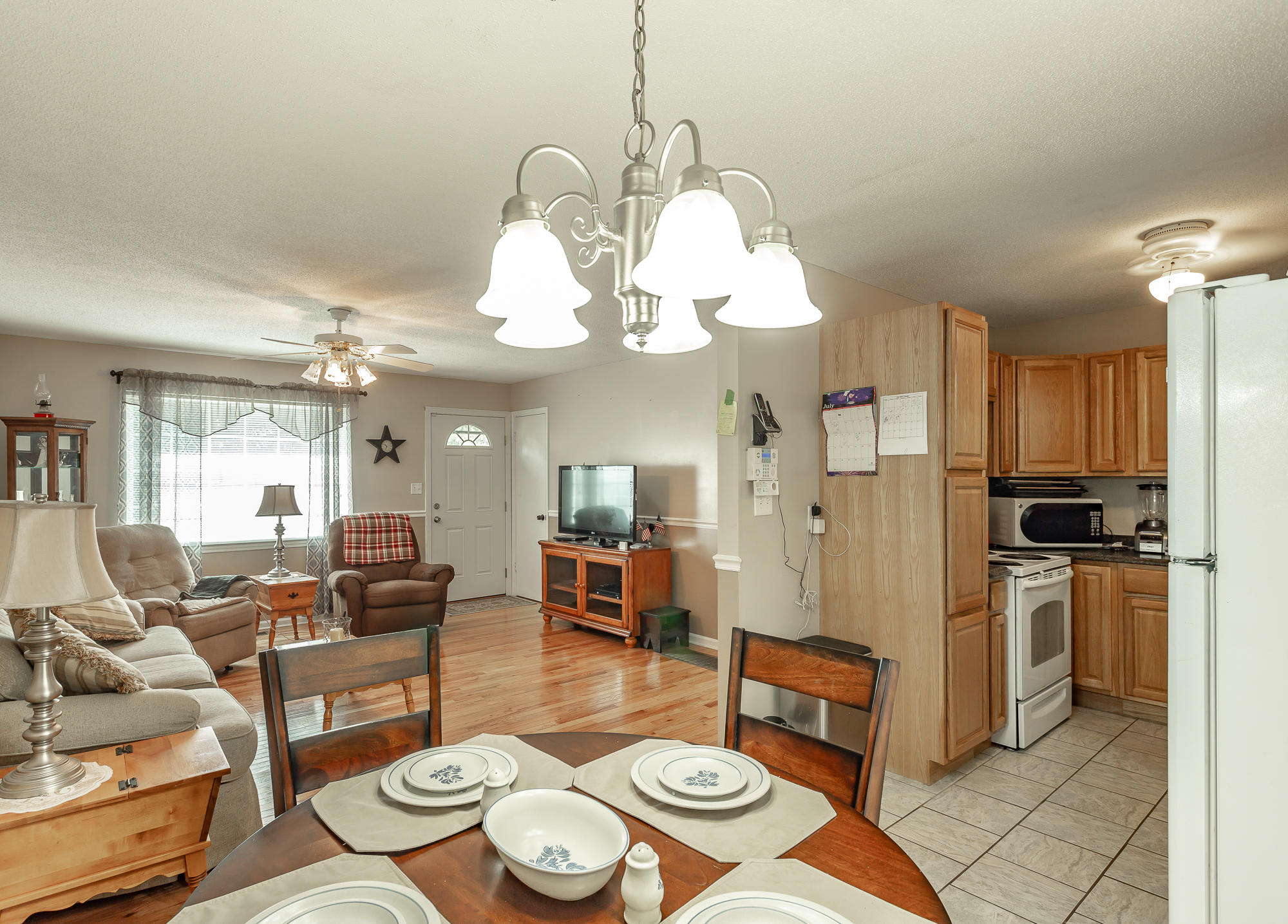 10422 Sims-Harris Road Ooltewah, TN 37363 - Photo 6 of 22 Dining to Living and Kitchen