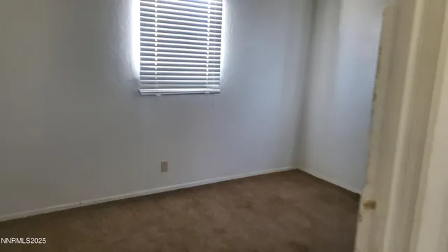 a view of a small space with window