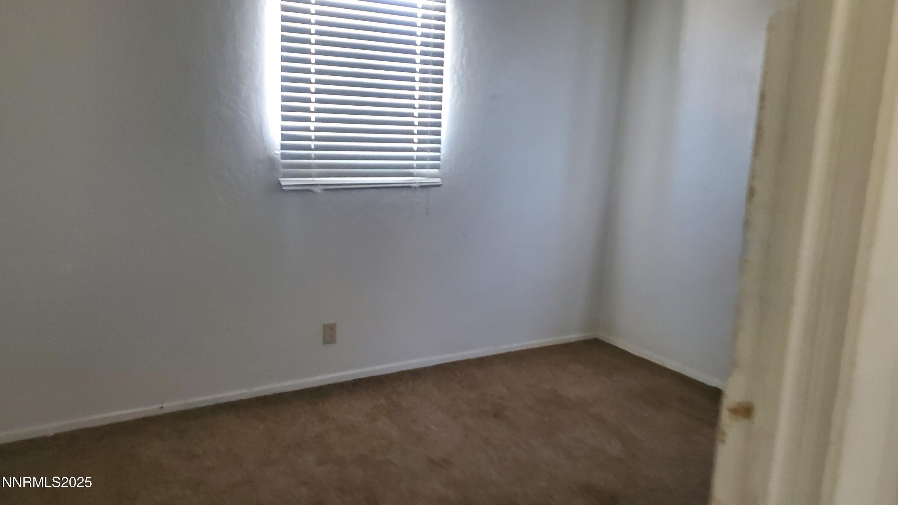 925 Arb Street Hawthorne, NV 89415 - Photo 5 of 10 a view of a small space with window