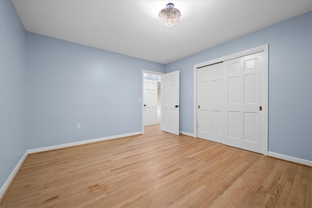 103 Satula Lane Clemson, SC 29631 - Photo 22 of 50 This inviting bedroom features natural hardwood flooring, creating a warm and comfortable atmosphere.