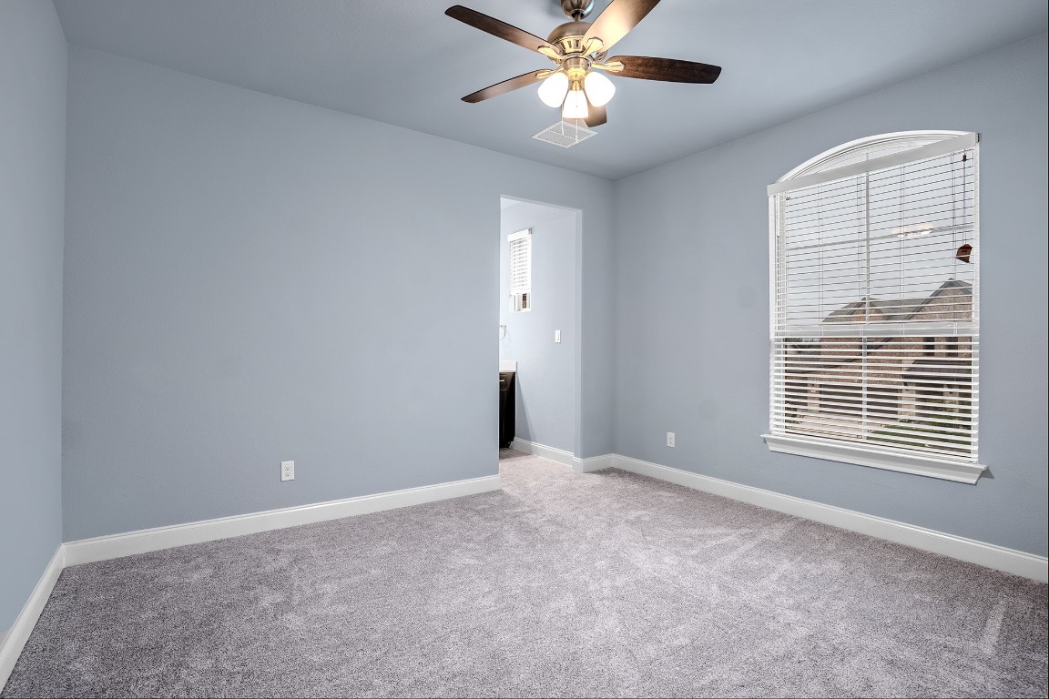 2328 Blended Tree Ranch Drive Leander, TX 78641 - Photo 25 of 30 a view of an empty room with a window