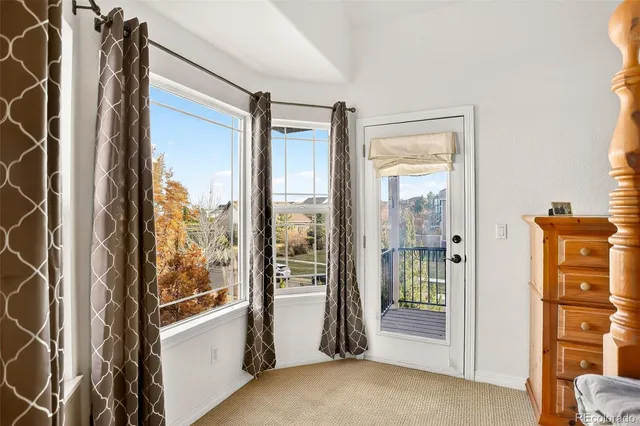 a view of front door and bedroom