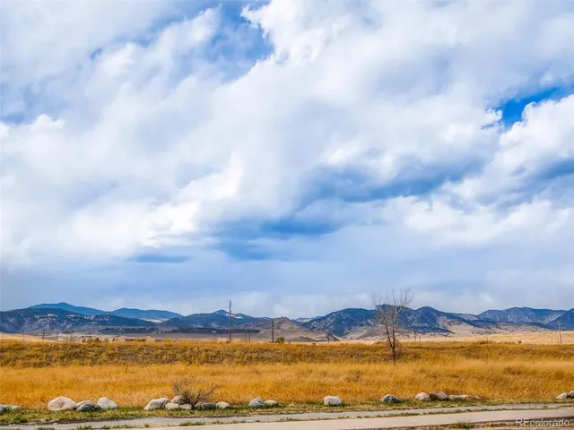 a view of a lake and sunset