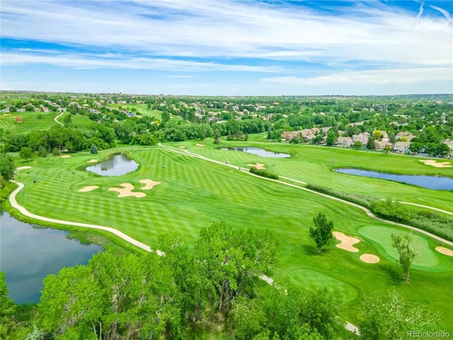 a view of a chairs and tables in the patio