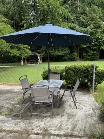 a view of outdoor space yard deck patio and outdoor kitchen
