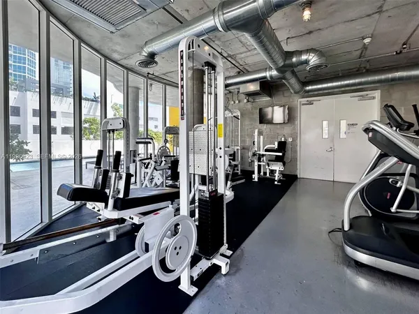 a view of a room with gym equipment