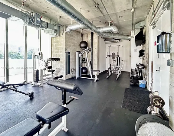 a view of a room with gym equipment