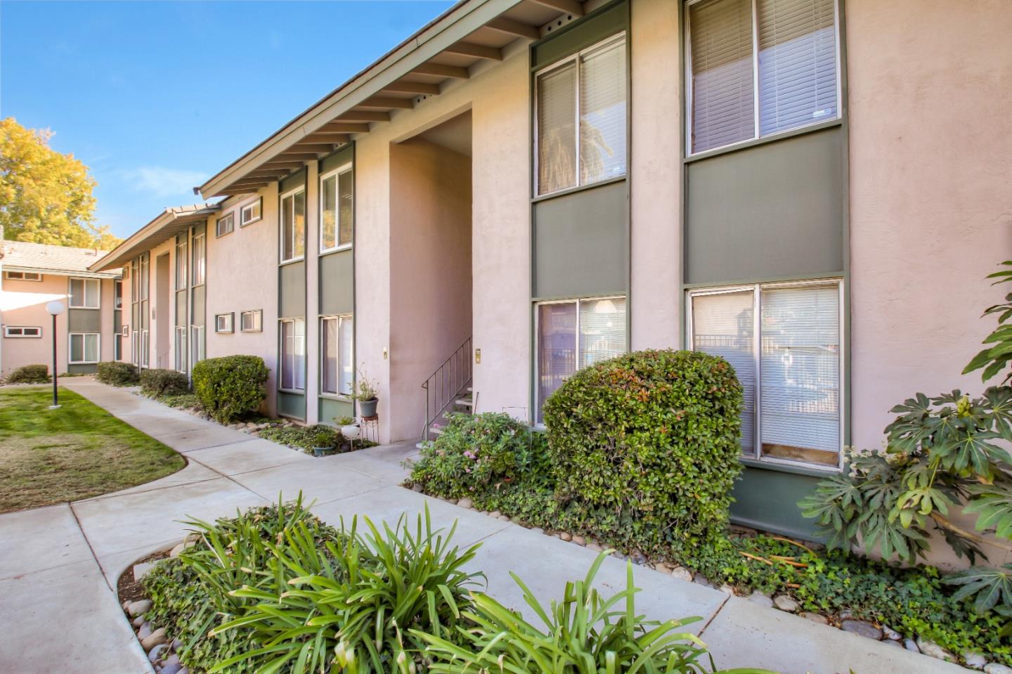 4888 Clayton Road, Unit 31 Concord, CA 94521 - Photo 1 of 23 a front view of a house with garden