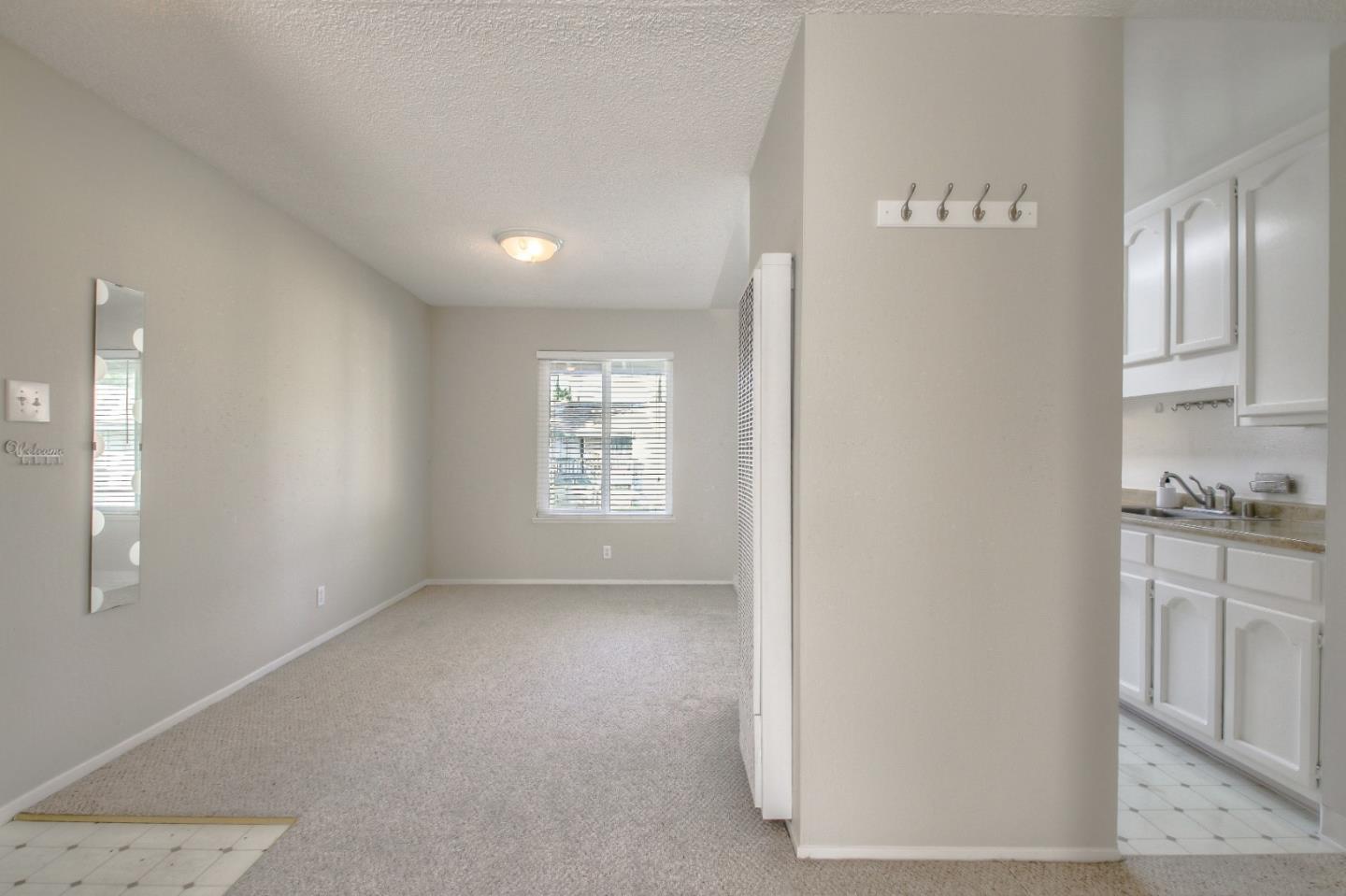4888 Clayton Road, Unit 31 Concord, CA 94521 - Photo 11 of 23 a view of an empty room with a window