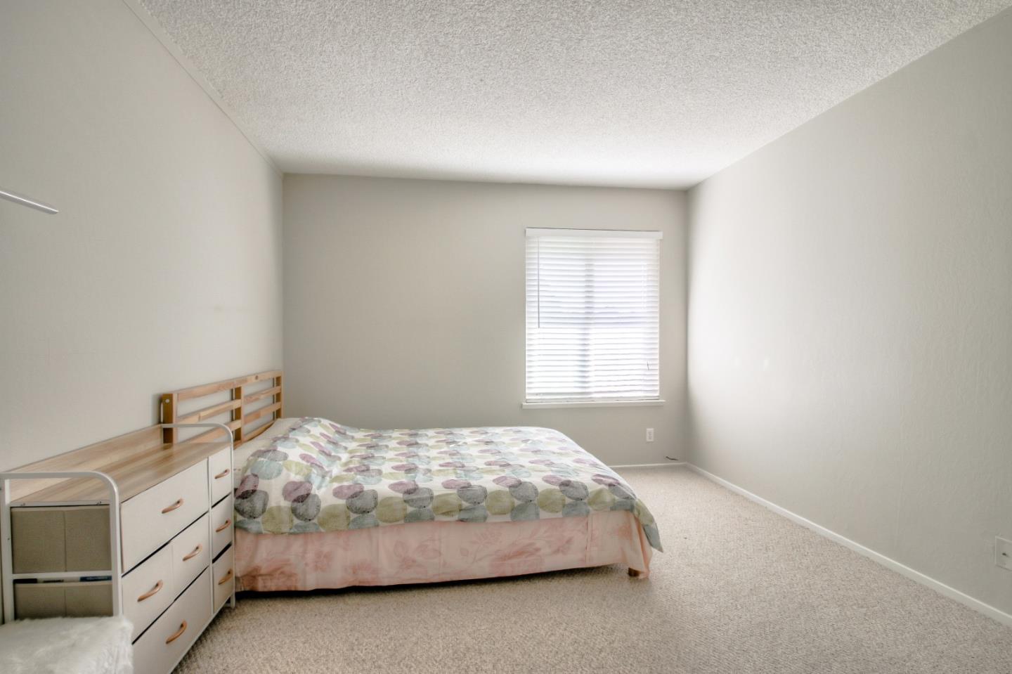 4888 Clayton Road, Unit 31 Concord, CA 94521 - Photo 15 of 23 a bedroom with a bed and window