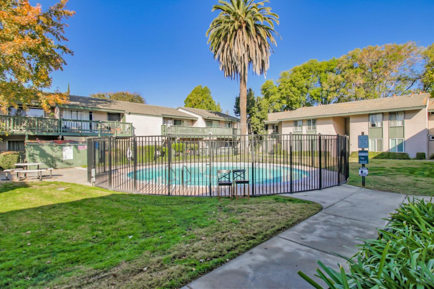 4888 Clayton Road, Unit 31 Concord, CA 94521 - Photo 19 of 23 a view of a backyard with a garden and plants