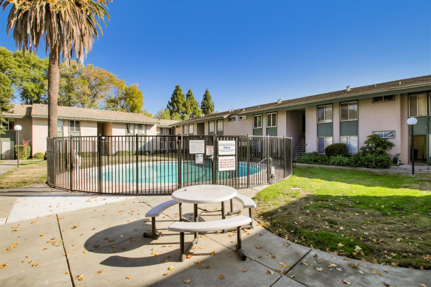 4888 Clayton Road, Unit 31 Concord, CA 94521 - Photo 20 of 23 a view of a house with backyard and sitting area