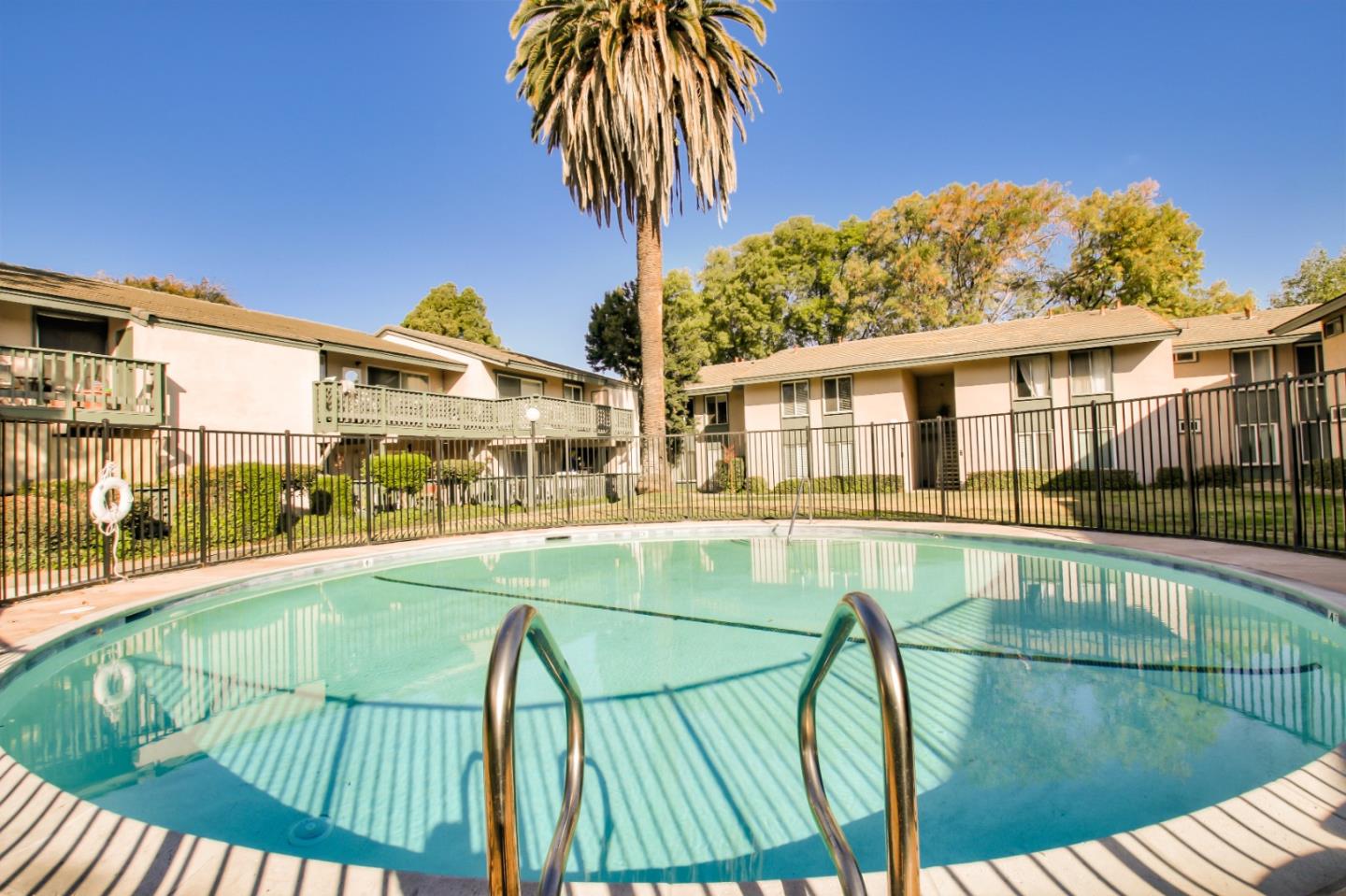 4888 Clayton Road, Unit 31 Concord, CA 94521 - Photo 21 of 23 a view of a swimming pool with a patio