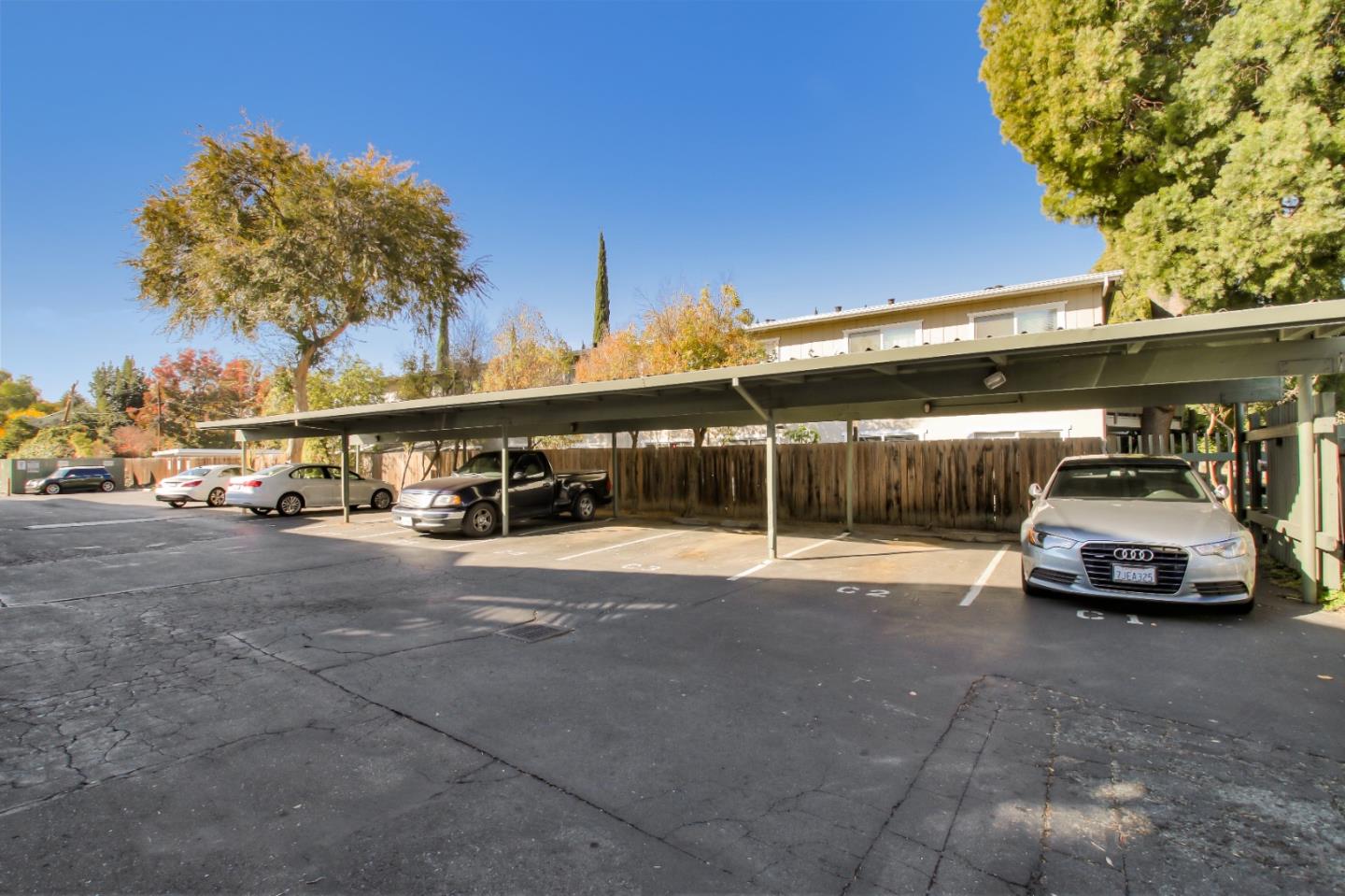 4888 Clayton Road, Unit 31 Concord, CA 94521 - Photo 22 of 23 a car parked on the side of a street