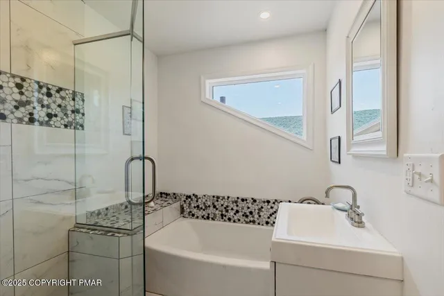 a view of a backyard with swimming pool