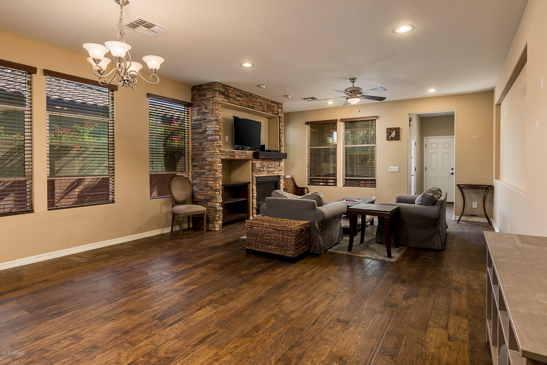 20705 West Ridge Road Buckeye, AZ 85396 - Photo 11 of 26 a living room with furniture and a large window