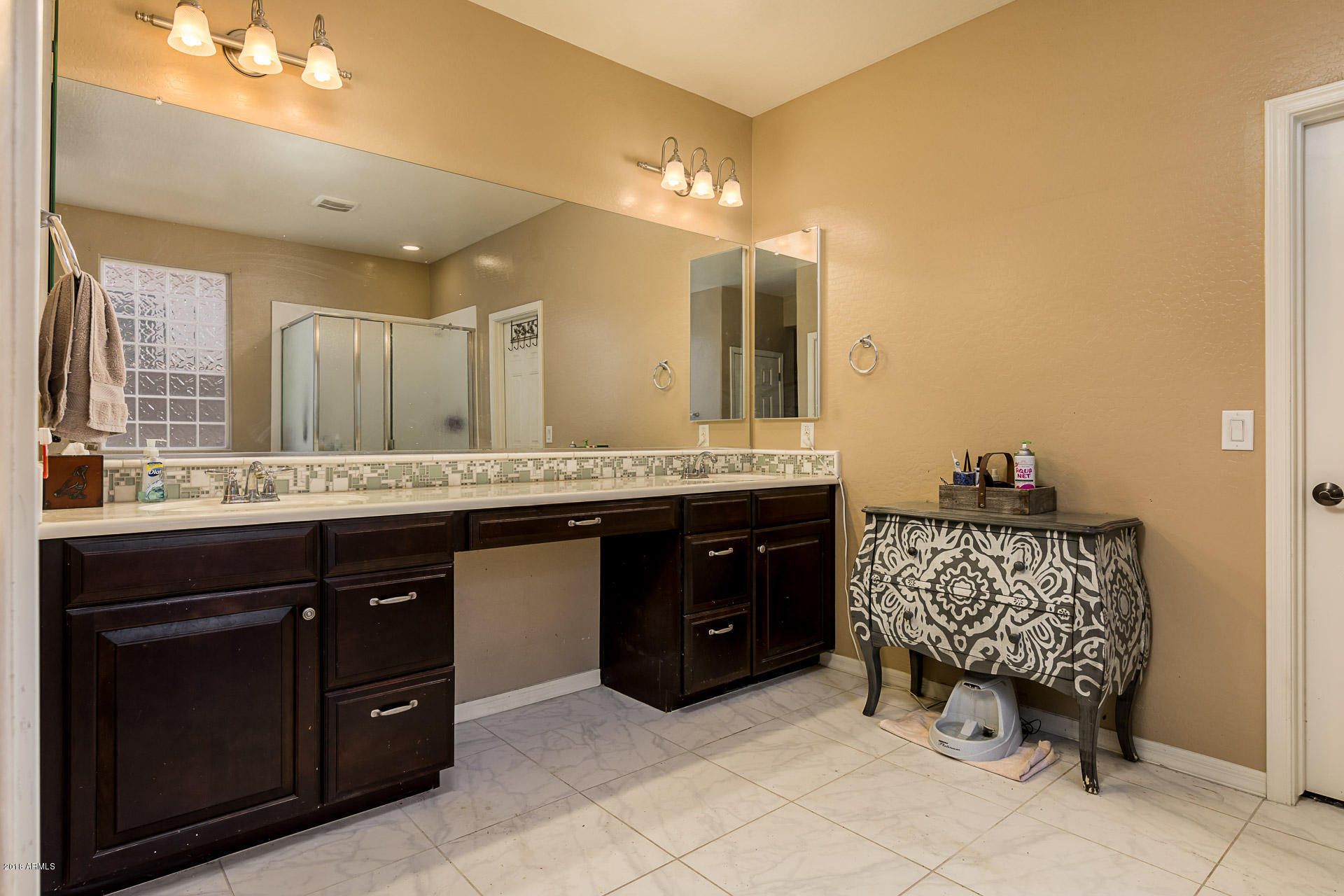 20705 West Ridge Road Buckeye, AZ 85396 - Photo 18 of 26 a bathroom with a sink double vanity and a mirror