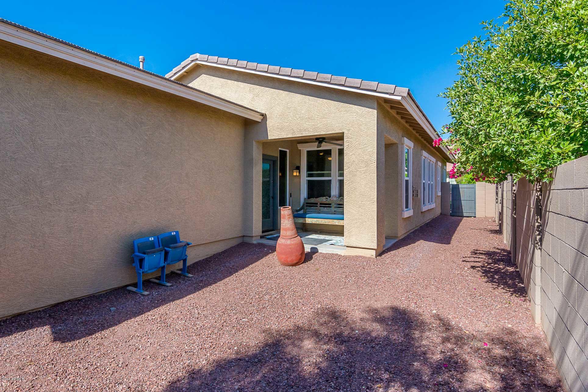 20705 West Ridge Road Buckeye, AZ 85396 - Photo 23 of 26 a view of an outdoor space with seating area