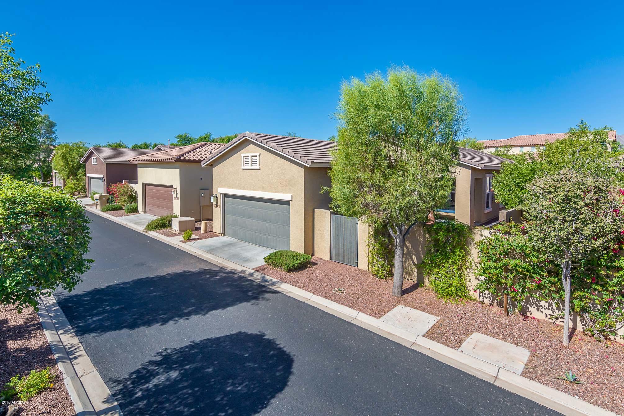 20705 West Ridge Road Buckeye, AZ 85396 - Photo 26 of 26 a front view of a house with a yard