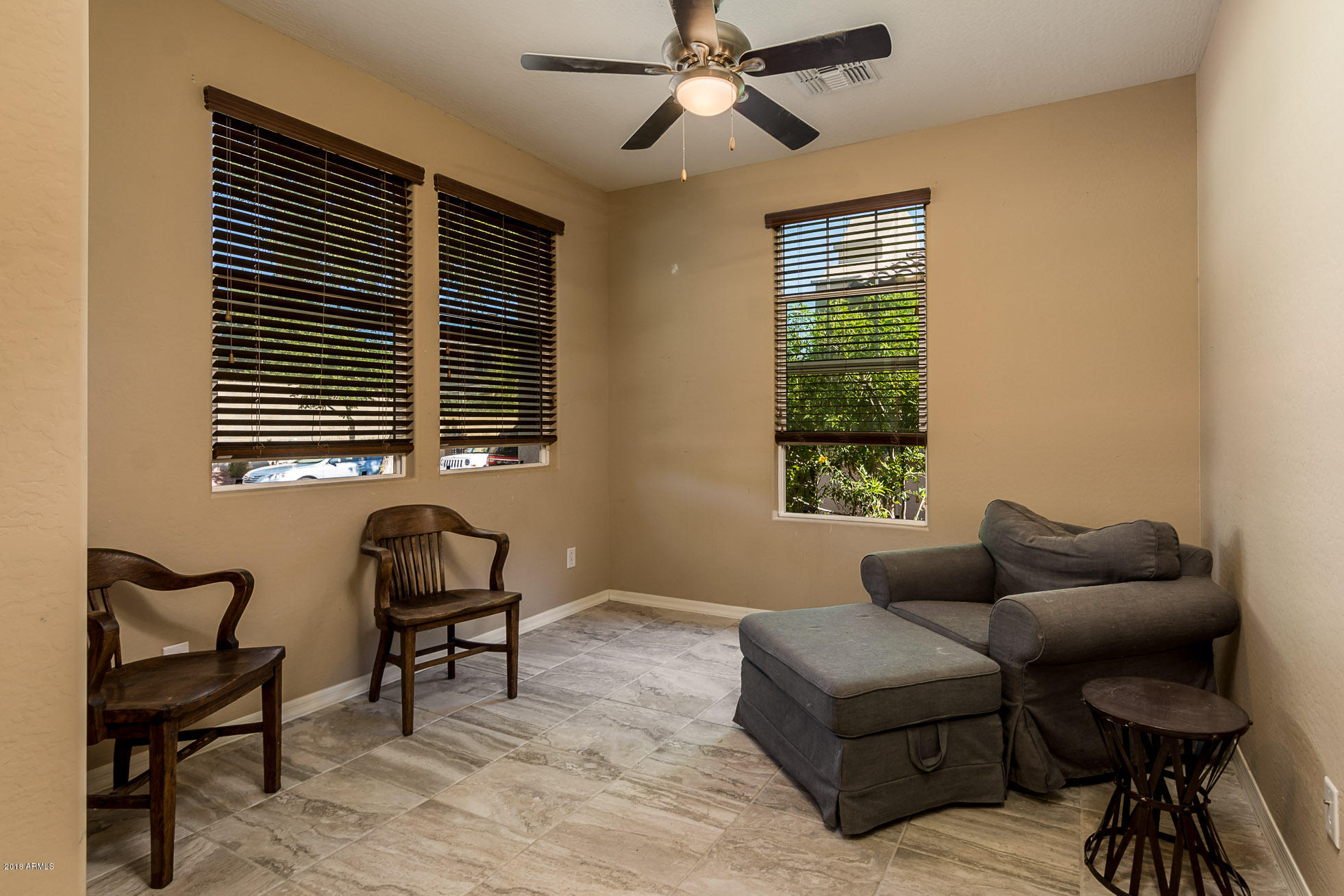 20705 West Ridge Road Buckeye, AZ 85396 - Photo 5 of 26 a living room with furniture and a window
