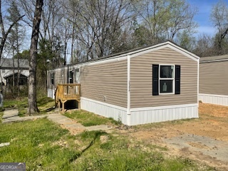 235 A West Big Indian Trail Rome, GA 30165 - Photo 28 of 28 a view of a house with a yard
