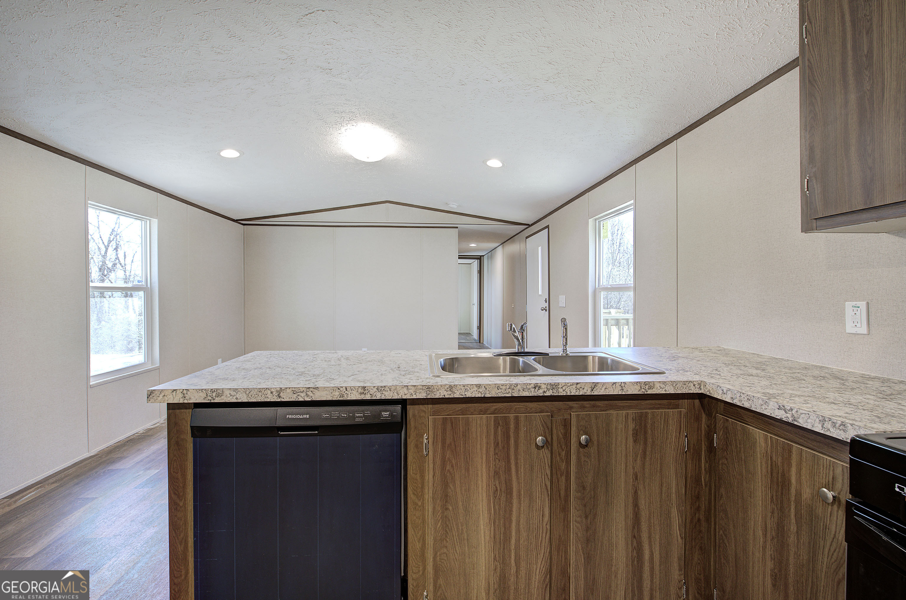 235 A West Big Indian Trail Rome, GA 30165 - Photo 3 of 28 a bathroom with a granite countertop sink and a mirror