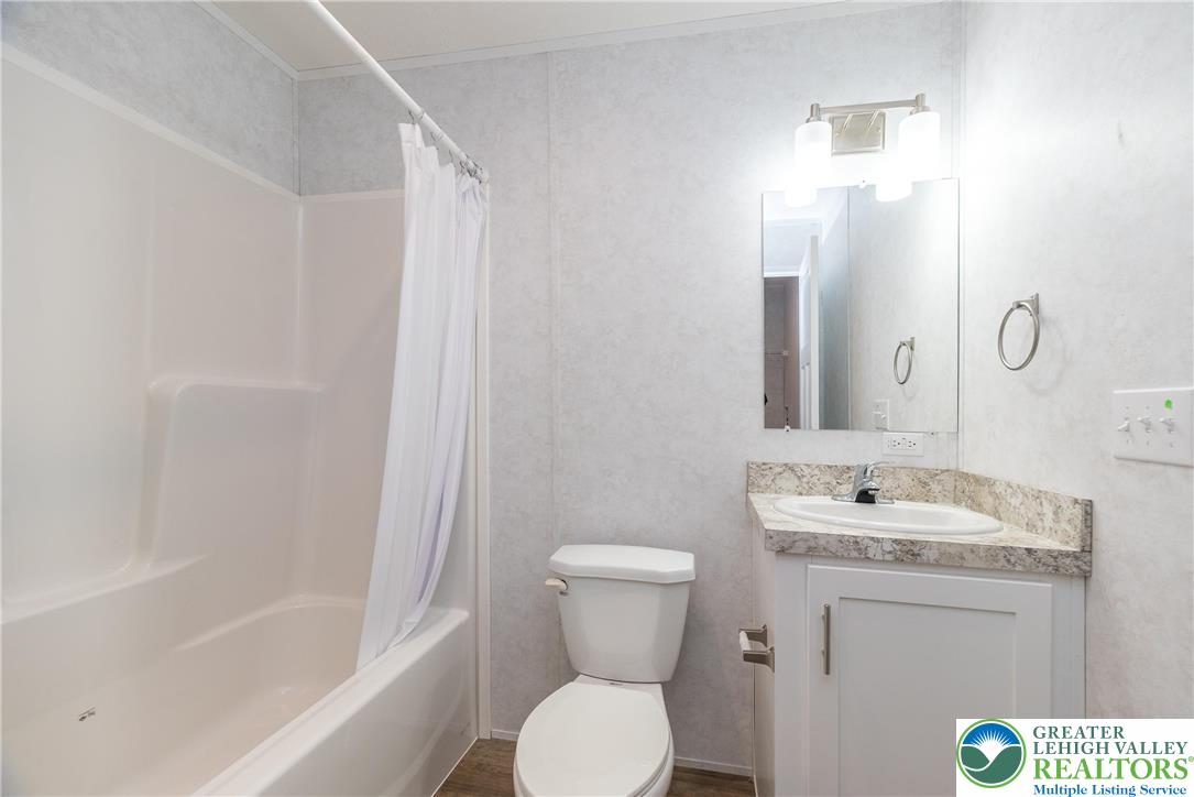 465 Royal Manor Road, Unit LOT 1 Easton, PA 18042 - Photo 11 of 15 a bathroom with a sink toilet and shower