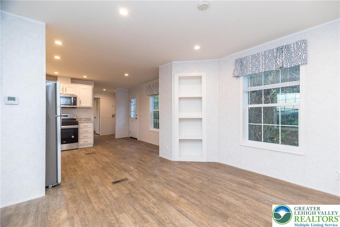 465 Royal Manor Road, Unit LOT 1 Easton, PA 18042 - Photo 6 of 15 a view of a kitchen with a sink and a refrigerator