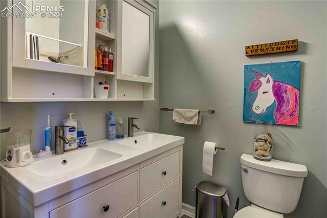 1330 Ride Lane Colorado Springs, CO 80916 - Photo 16 of 48 Upper Hallway 4-Piece Full Bath