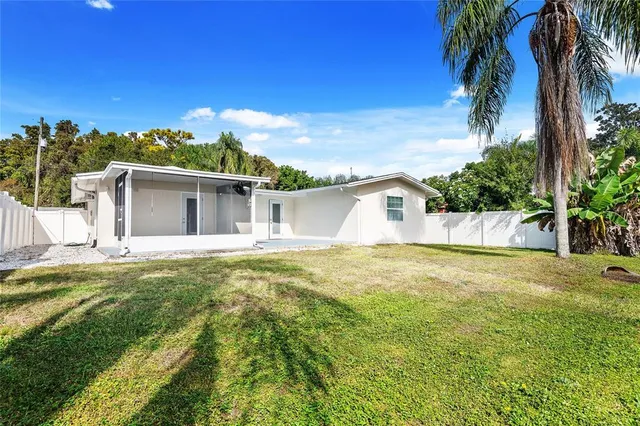 a bathroom with a sink and a yard